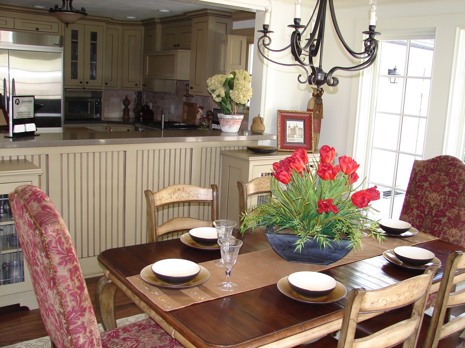Dining area open to a renovated kitchen