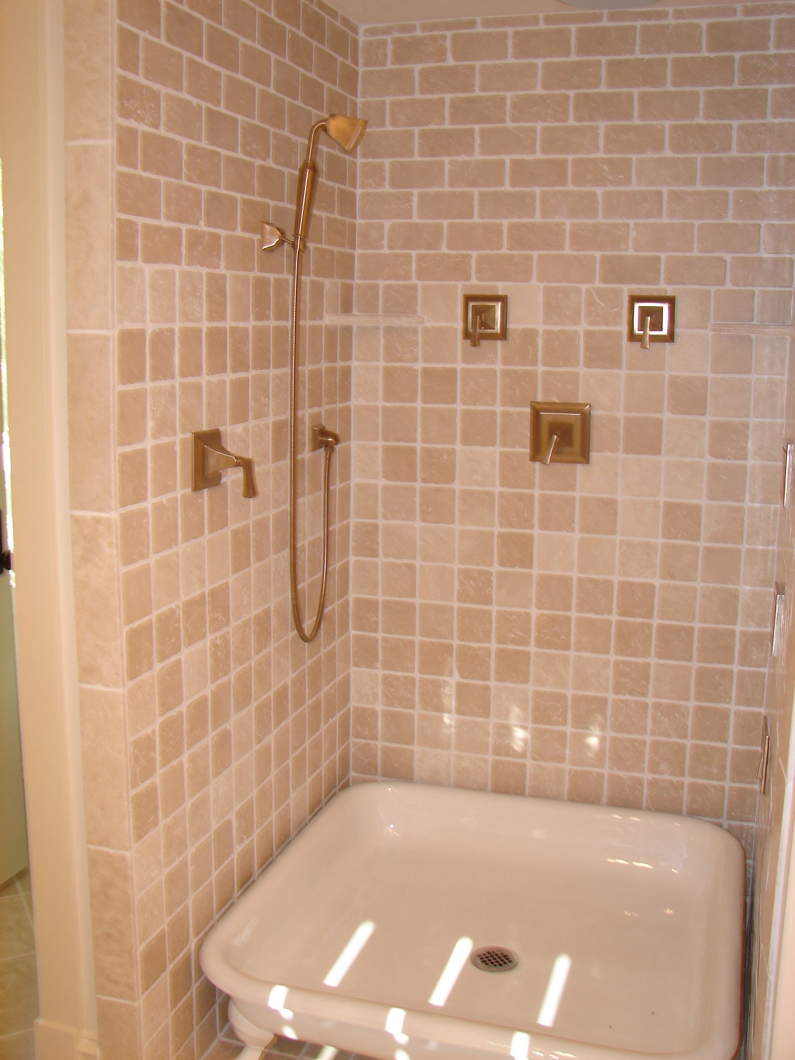 Tiled shower with a built-in bench